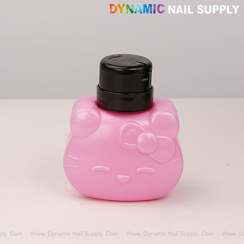 A pink Refillable Press Hello Kitty bottle with black pump, bow, and closed eyes, on a white surface.