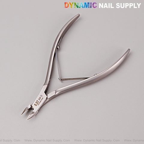 D07 Jaw 12 Cuticle Nippers—super fine jaw clippers, smooth spring action; DYNAMIC NAIL SUPPLY at top right.