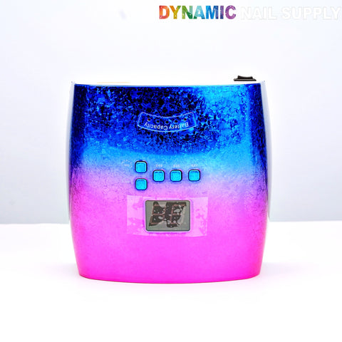 Metallic blue-to-pink [Rainbow] Cordless LED/UV Lamp 48W Nail Dryer; four blue buttons, DYNAMIC NAIL SUPPLY logo.