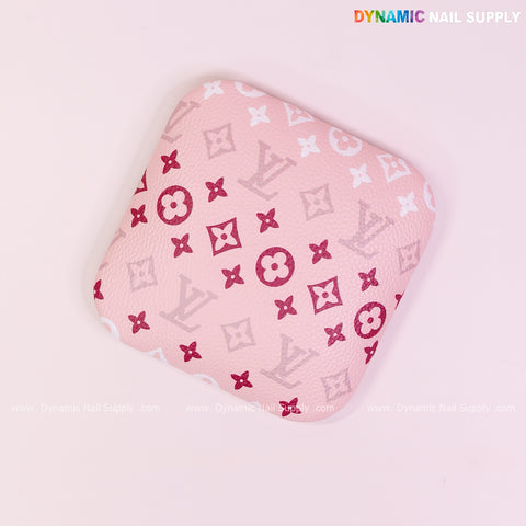 The (RA018) Elbow Armrest is pink, square, and microfiber leather—soft LV-style support for nail technicians.