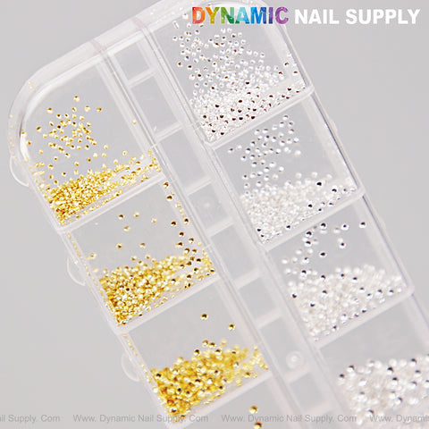 Gold and silver hollow semi-sphere beads in mixed sizes for nail DIY designs; DYNAMIC NAIL SUPPLY text at top.