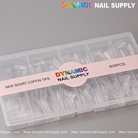 Clear plastic case labeled New Short Coffin Nail Tips Half Cover - 600 pcs - 12 sizes holds tip compartments.