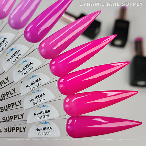Five nail swatches display Dynamic No-HEMA Gel Polish 371–380, Pretty Pink Colors, with blurred bottles in the background.