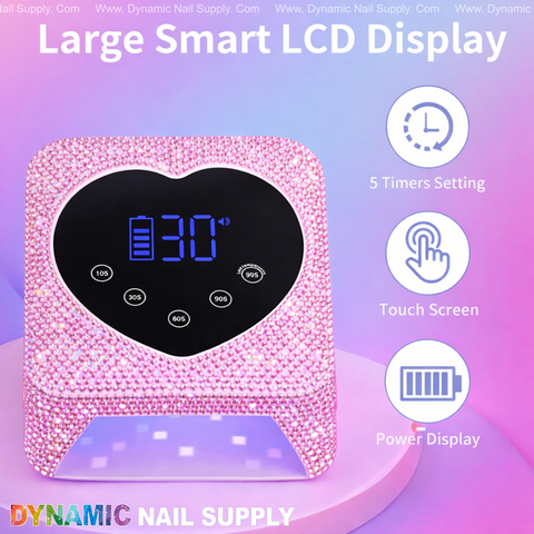 Pink Big Rhinestone UV/LED Cordless 72W Lamp, heart-shaped display, auto sensor, 5 timer settings on purple background.