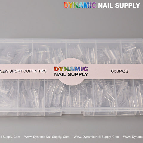 A clear case holds 600 New Short Coffin Nail Tips Half Cover in 12 sizes, organized in compartments.