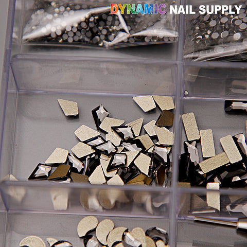 A 20-cell box holds 14 big shapes, 6 round Black Silver-back mixed Gold-back rhinestones for nail art.