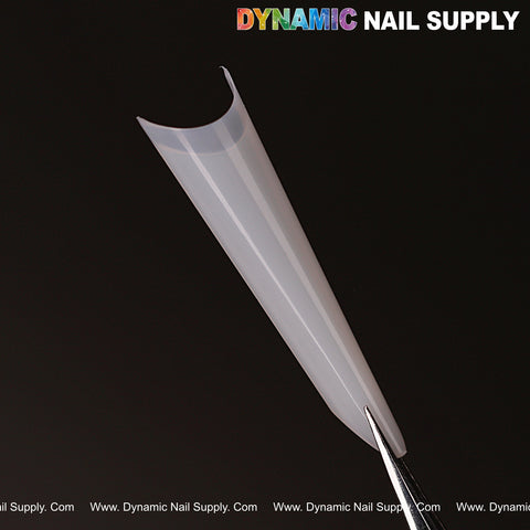 A Russia Almond Natural White Nail Tip held by tweezers on black background with DYNAMIC NAIL SUPPLY text at top.
