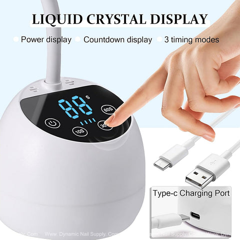 A hand sets the time on a [White] Mini Flash Cure UV LED Lamp 36W with auto sensor, gooseneck, and USB nail dryer.