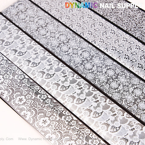 Five strips of Nail Art Design Foils - White and Black Lace Nail Foil, perfect for stunning floral nail art.
