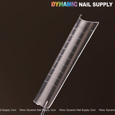 An XXL Square Nail Tip (Not C-Curve) Clear with lines stands upright, Dynamic Nail Supply text in the background.