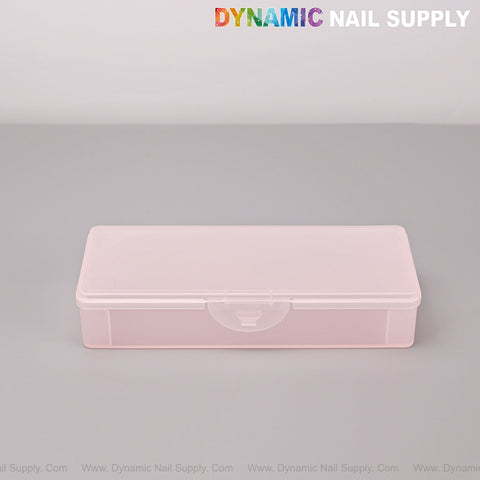 The [Clear Pink] Nail Brush Case Frosted Pen Box with snap closure on gray surface under DYNAMIC NAIL SUPPLY text.
