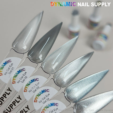 Six swatches of Icy Cat Eye Gel #06, a reflective magnetic silver shimmery gel polish, with blurred bottles behind.