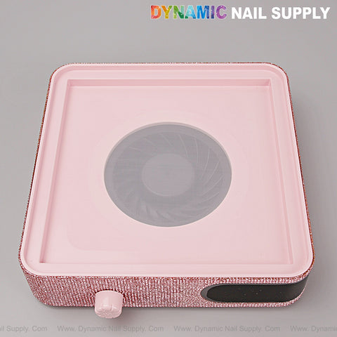 Rechargeable pink rhinestone nail dust collector with strong suction, adjustable speed, display, and reusable filter.