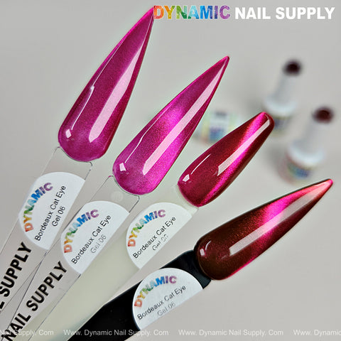 Four swatches of Bordeaux Cat Eye #6, a magnetic glassy red wine shimmery gel polish, with blurred bottles behind.