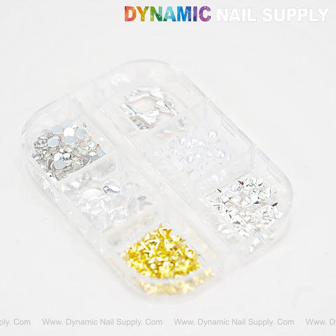 A clear box with six compartments holds Sparkling Good and Silver Star Nail Charms for DIY nail designs.