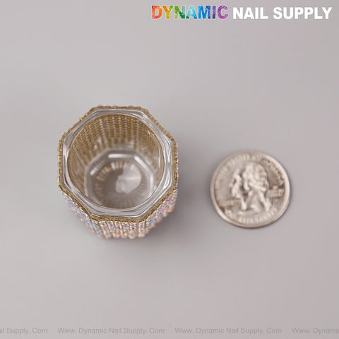 An AB Rhinestone Small Cup Dappen Dish sits by a U.S. quarter; Dynamic Nail Supply logo displayed above.
