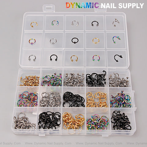 A box of Gold, Silver, Titanium, and Black Piercing Nail Charms—Punk Alloy Y2K Nail Art DIY Accessories.