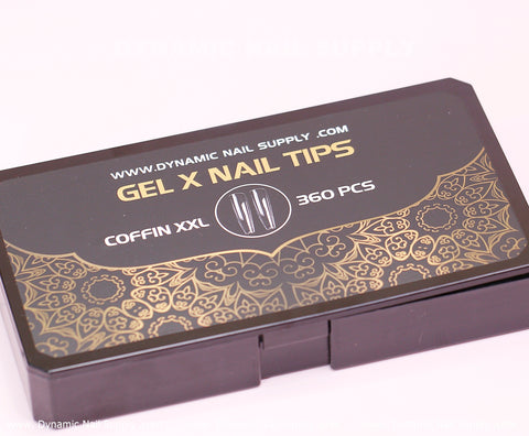 A black box of Full Cover Tips from Dynamic Nail Supply showcases decorative gold patterns. The text reads Soft Gel X tips, Extra Long Coffin XXL, and 360 pcs, with the website www.dynamicnailsupply.com elegantly displayed.