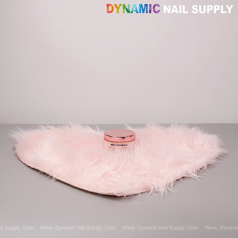A Light Pink Faux Fur Heart Display Mat, perfect for lockers, tabletops, nail art or jewelry photo backdrops.
