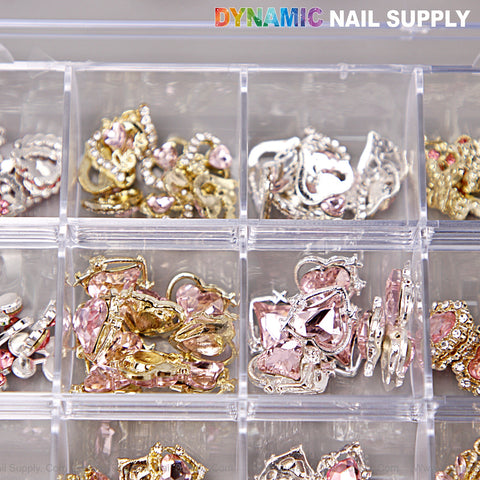 Pink Silver Gold Heart Shape Cherry Crown Planet Charm Set Box organizes nail art accessories; “DYNAMIC NAIL SUPPLY” above.