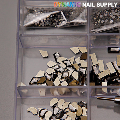 The [Black Silver-back mixed Gold-back] Rhinestone set holds 14 big and 6 round shapes for eye-catching nail art.
