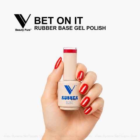 Hand with red nails holds V Beauty Pure - Bet On It Rubber Base Gel Polish; text and logo above on white background.