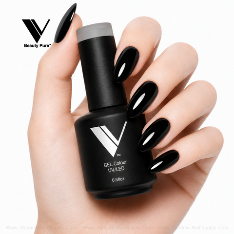 A hand with long black nails holds V Beauty Pure - Super Black Gel Polish 048, pro techs’ chip-resistant favorite, on white.
