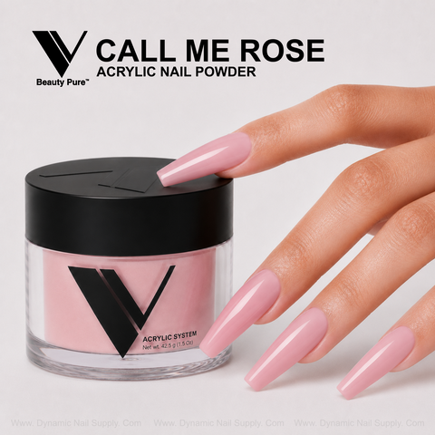 A hand with long pink acrylic nails touches a Call Me Rose - V Beauty Pure Acrylic Powder jar on a light background.