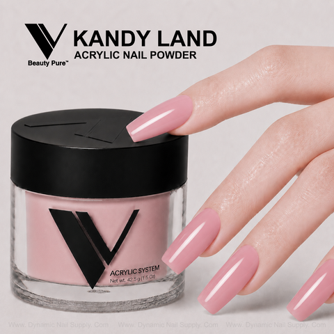 Long pink nails touch a jar of V Beauty Pure - Kandy Land Acrylic Powder, perfect for stylish nail art.