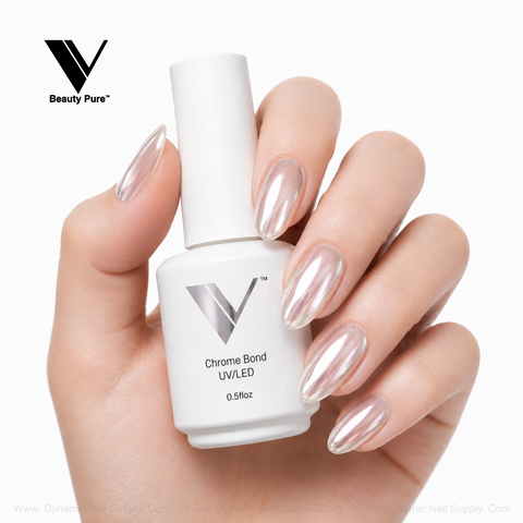 A hand with iridescent chrome nails holds a white V Beauty Pure - Chrome Bond UV/LED nail polish bottle.