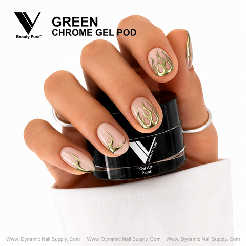 Almond nails with metallic green flames hold a Green V Beauty Pure Chrome Gel Pod by Dynamic Nail Supply.