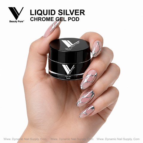 Hand with chrome-accented nails holds a black Liquid Silver V Beauty Pure Chrome Gel Pod by Dynamic Nail Supply.