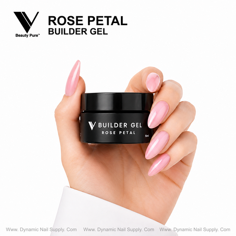 Hand with pink stiletto nails holds Rose Petal - V Beauty Pure Builder Gel 15ml by Dynamic Nail Supply.