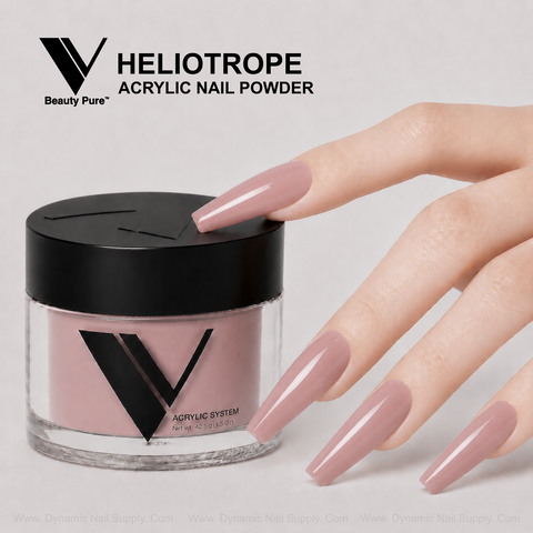 A hand with long, square pink nails rests next to a jar of V Beauty Pure - Heliotrope Acrylic Powder.