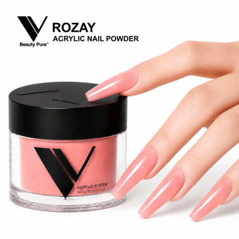 A hand with long, glossy pink nails points to V Beauty Pure - Rozay Acrylic Powder for stunning salon-quality nail art.