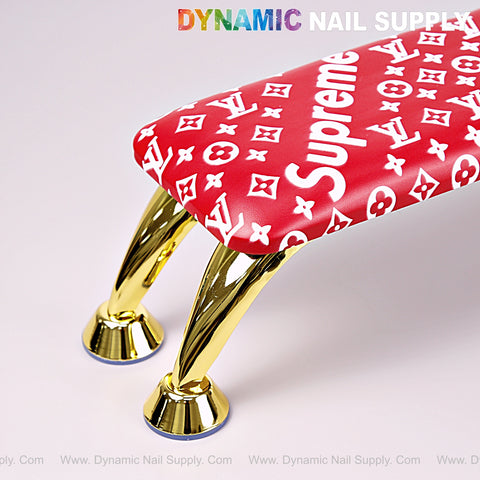 The [R-A043] Red 5upreme Pattern Handrest Armrest for Mani Pedi is shown under the Dynamic Nail Supply logo.