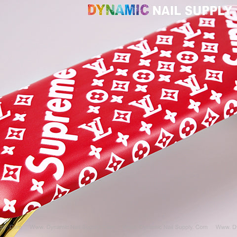 Red [R-A043] 5upreme Pattern Handrest for manicure/pedicure with white Supreme & LV logos, under DYNAMIC NAIL SUPPLY text.