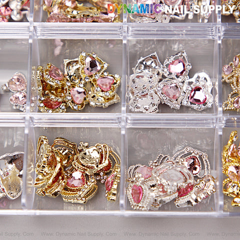 The Pink Silver Gold Heart Shape Cherry Crown Planet Charm Set Box organizes nail art accessories by color.