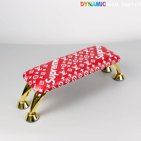 [R-A043] Red 5upreme Pattern Handrest Armrest for mani-pedi sits under Dynamic Nail Supply text.