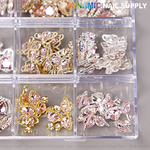 The Pink Silver Gold Heart Shape Cherry Crown Planet Charm Set Box stores nail art design accessories with pink accents.