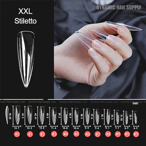 Hand holding [Stiletto XXL] Full Cover Tips (Soft Gel X, 360 pcs, 11 sizes); size guide & sample nail on black background.
