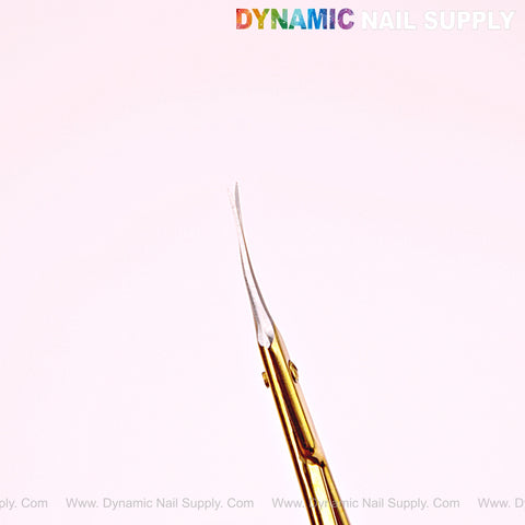 NT1245 Gold Premium Curved Cuticle Scissors with stainless steel blades shown on a light pink background, logo at top.