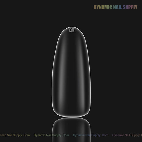 A single Natural Round (Long) Full Cover Soft-Gel Nail Tip (Black Box) on a dark backdrop with subtle branding above.