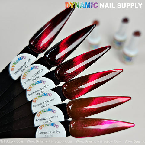 Six swatches show Bordeaux Cat Eye #1, a magnetic glassy red wine gel polish with a shimmery finish, on clear sticks.