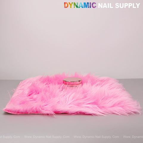 A Hot Pink Faux Fur Fabrics Square Display Mat sits under “DYNAMIC NAIL SUPPLY” on a gray background.