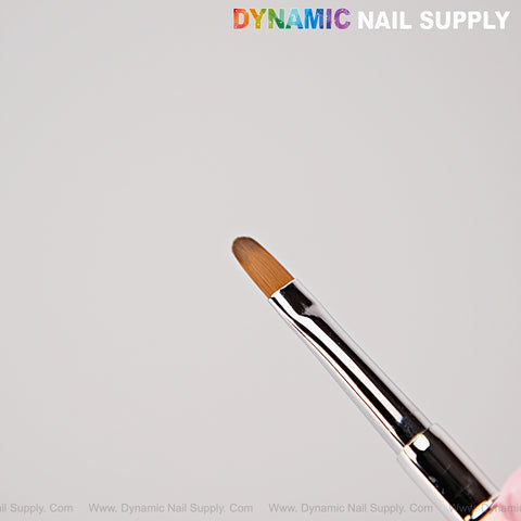 A close-up of the Silver Pink Builder Gel Dual Head Brush—oval brush & 15mm liner, DYNAMIC NAIL SUPPLY logo on top.