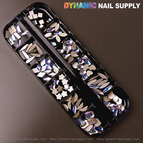 A black case holds Crystal Blue AB 6 mixed raindrop, square, heart, and moon nail rhinestone gems in 12 shapes.