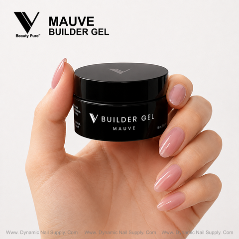 A hand with mauve nails holds Mauve - V Beauty Pure Builder Gel by Dynamic Nail Supply against a white background.