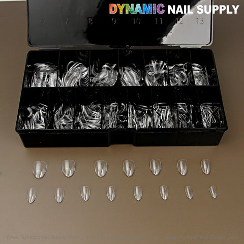 Black box holds Sculpted Almond (Short) Full Cover Soft-Gel Nail Tips; sample tips arranged below.