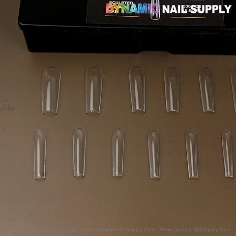 Fourteen Sculpted Square (XXL) Soft-Gel Tips are arranged in rows, with the Black Box partially visible above.